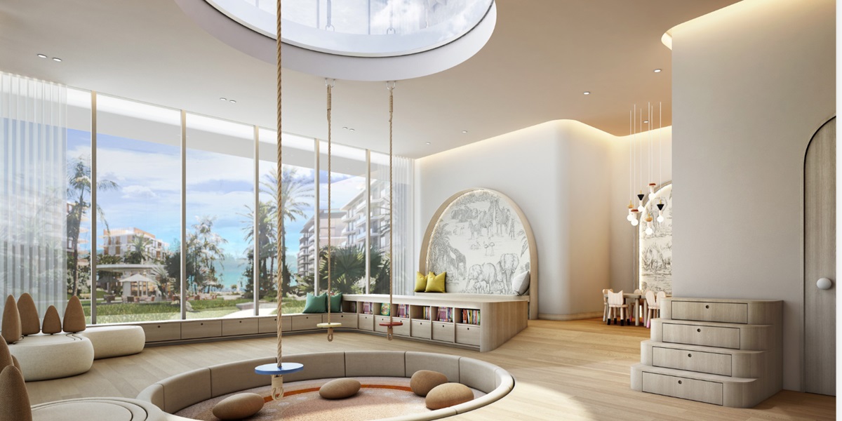 Indoor kids club at Bay Grove Residences with beach views
